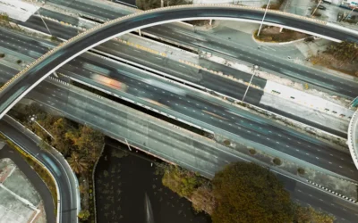 an aerial view of a highway intersection with multiple lanes