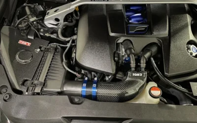 the engine compartment of a car with the hood up