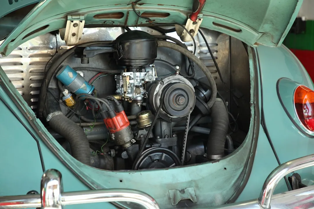 green and black car engine bay