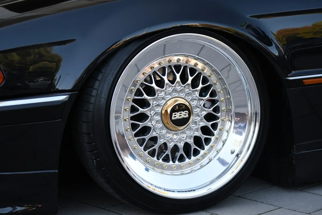 Close-up of a shiny custom car wheel with bbs logo.