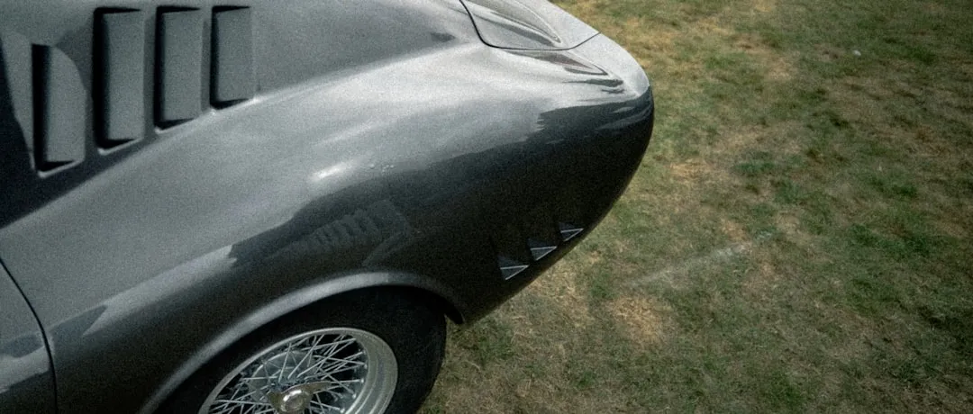 Close-up of a vintage car's fender and wheel