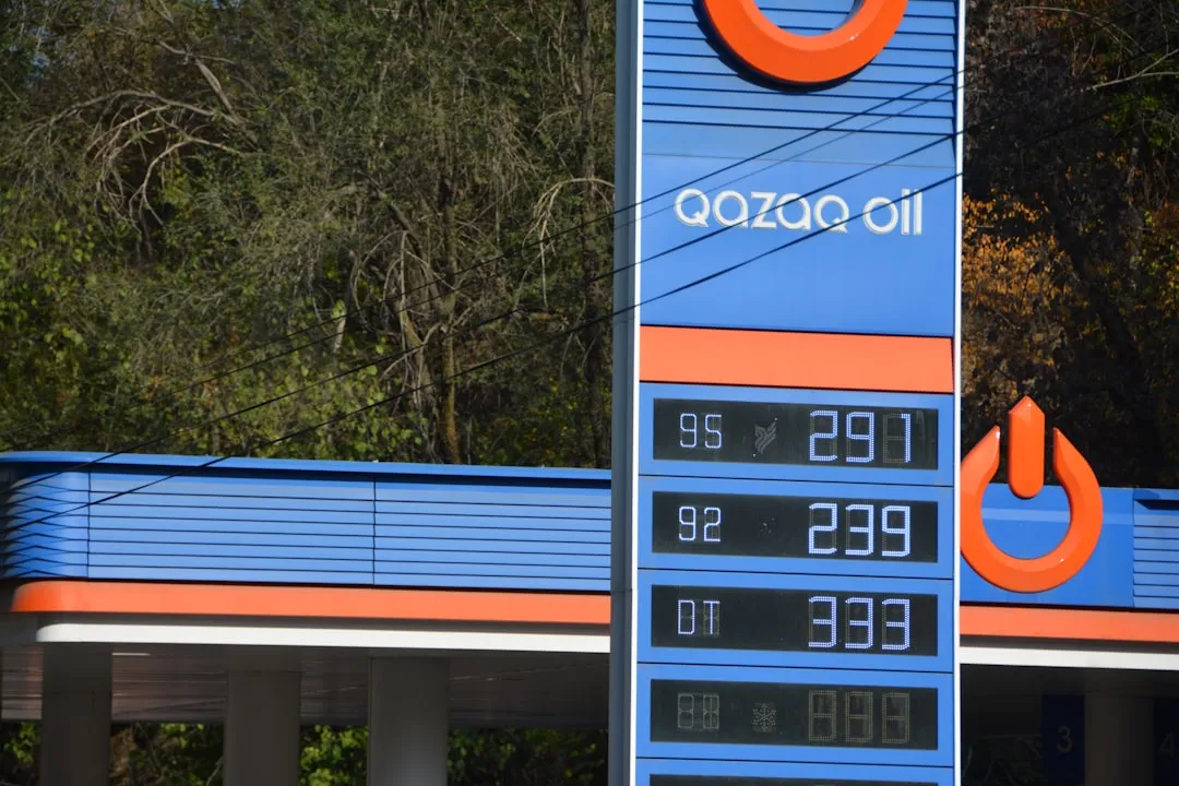 Gas station price board with qazaoil logo