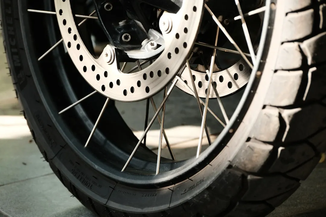 Motorcycle tire and wheel close-up.