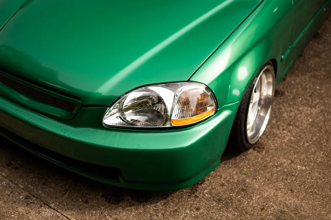 Green car fender and headlight detail